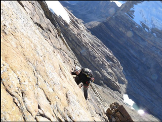 A mountaineer makes his way towards El Castillo, one of El Cocuy's tougher summits